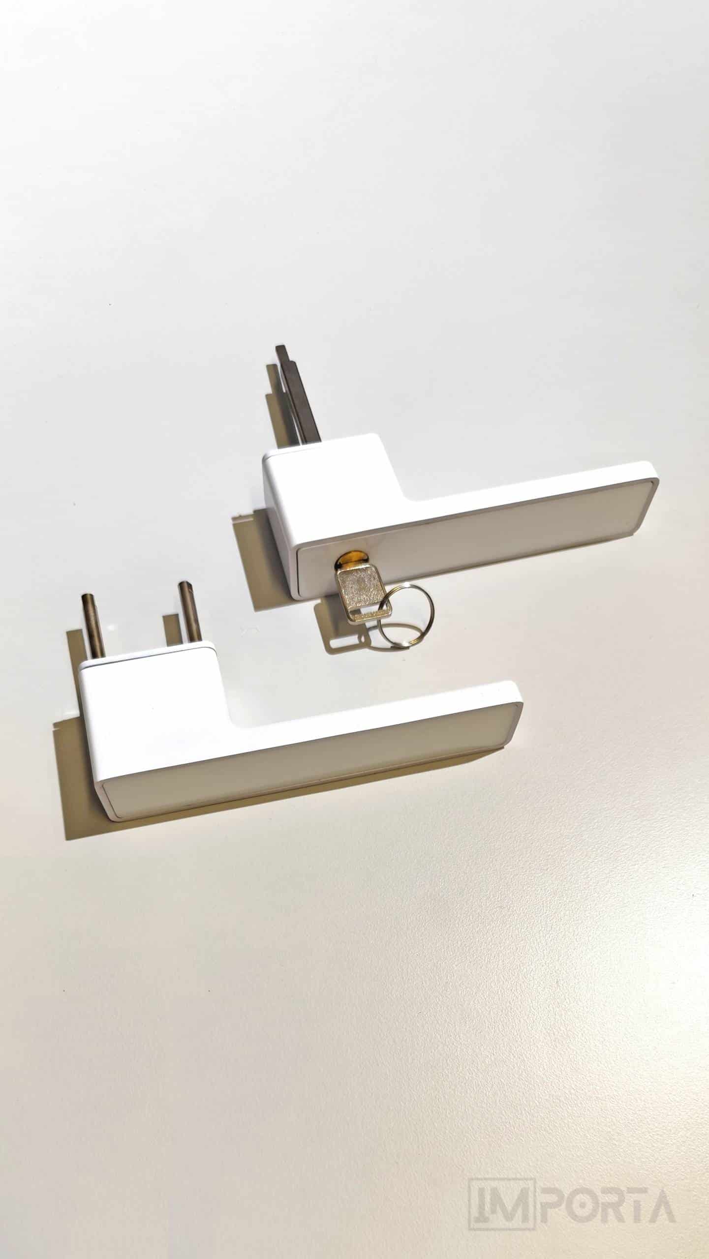 Invisible_square_white_interior_door_handle_with_key_thumb_Importa_UAE.jpg
