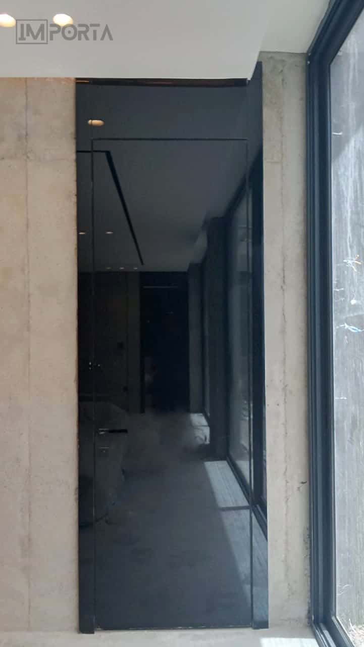 Concealed_Black_Tempered_Glass_Doors_with_Wall_Panels_ Importa_UAE