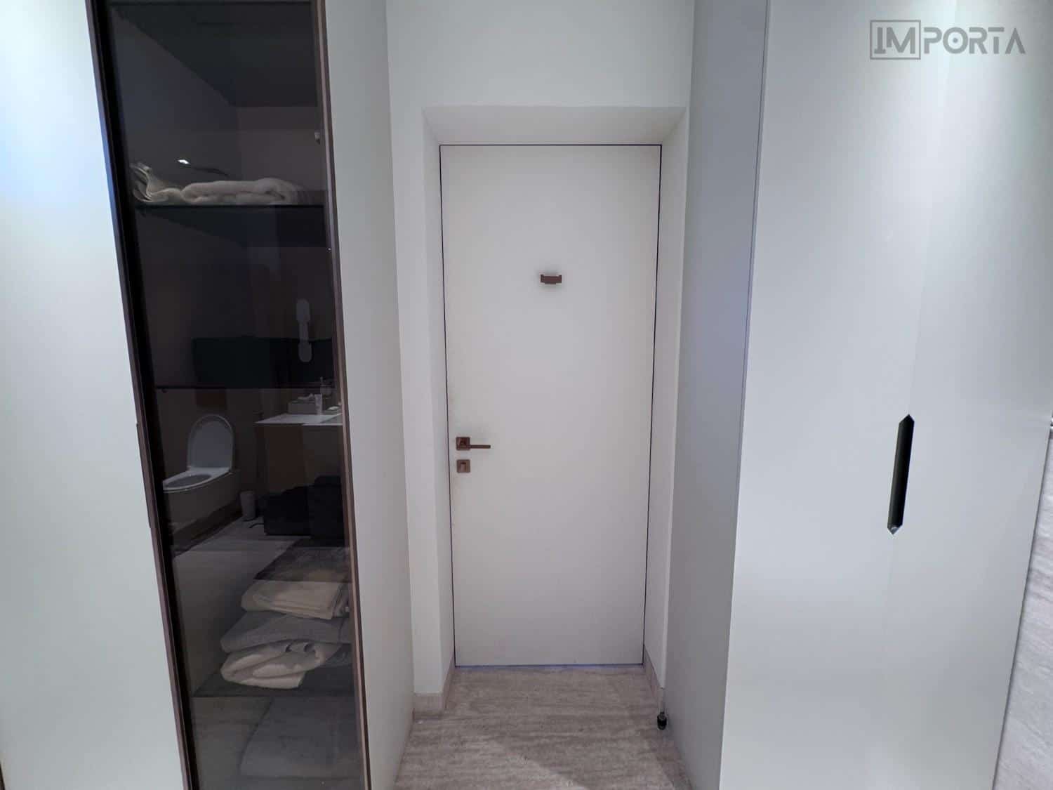 minimalistic-hidden-door-seamless-wall-installation.jpg