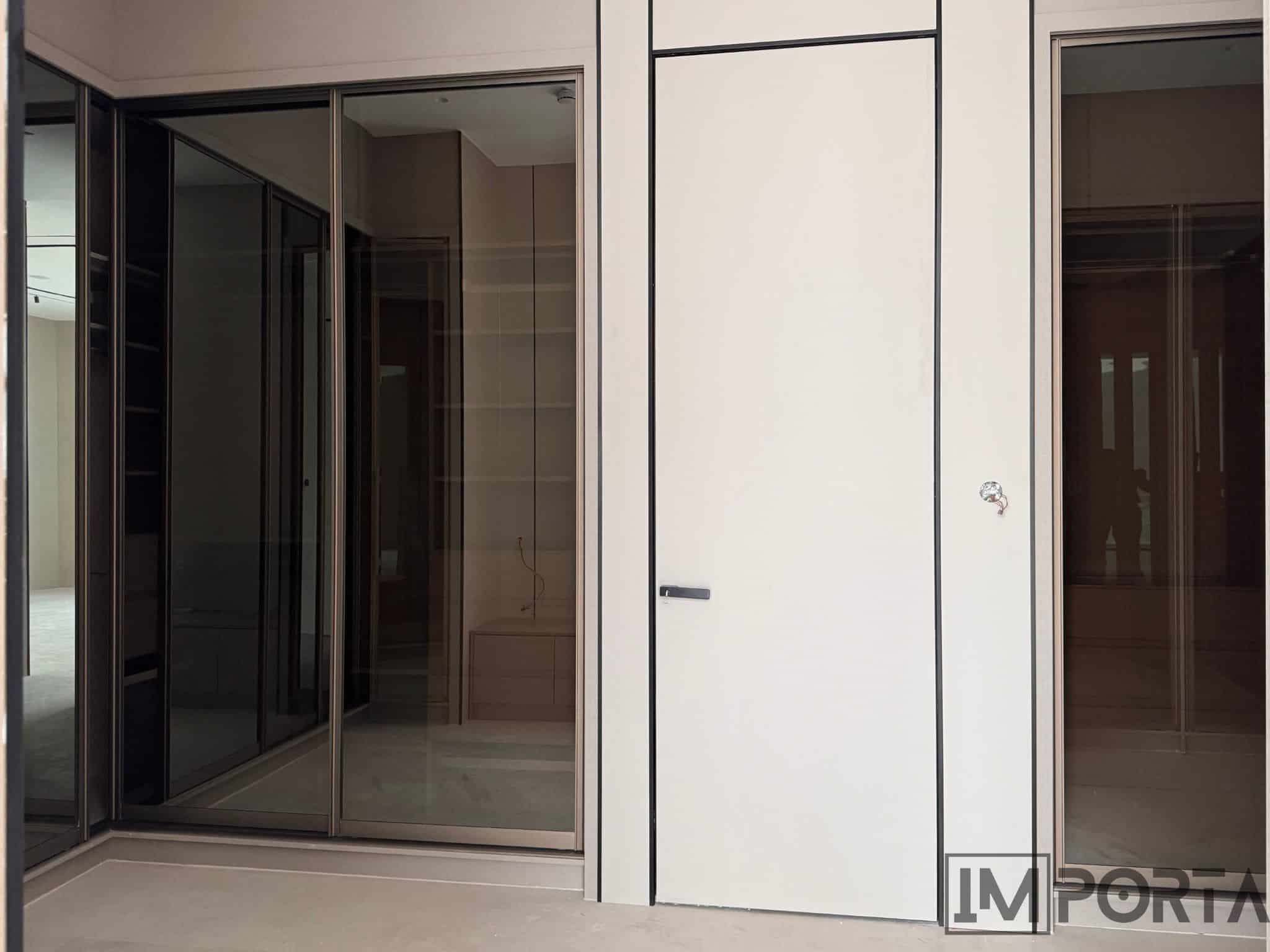 HPL Hidden Doors with Royal Black Profiles