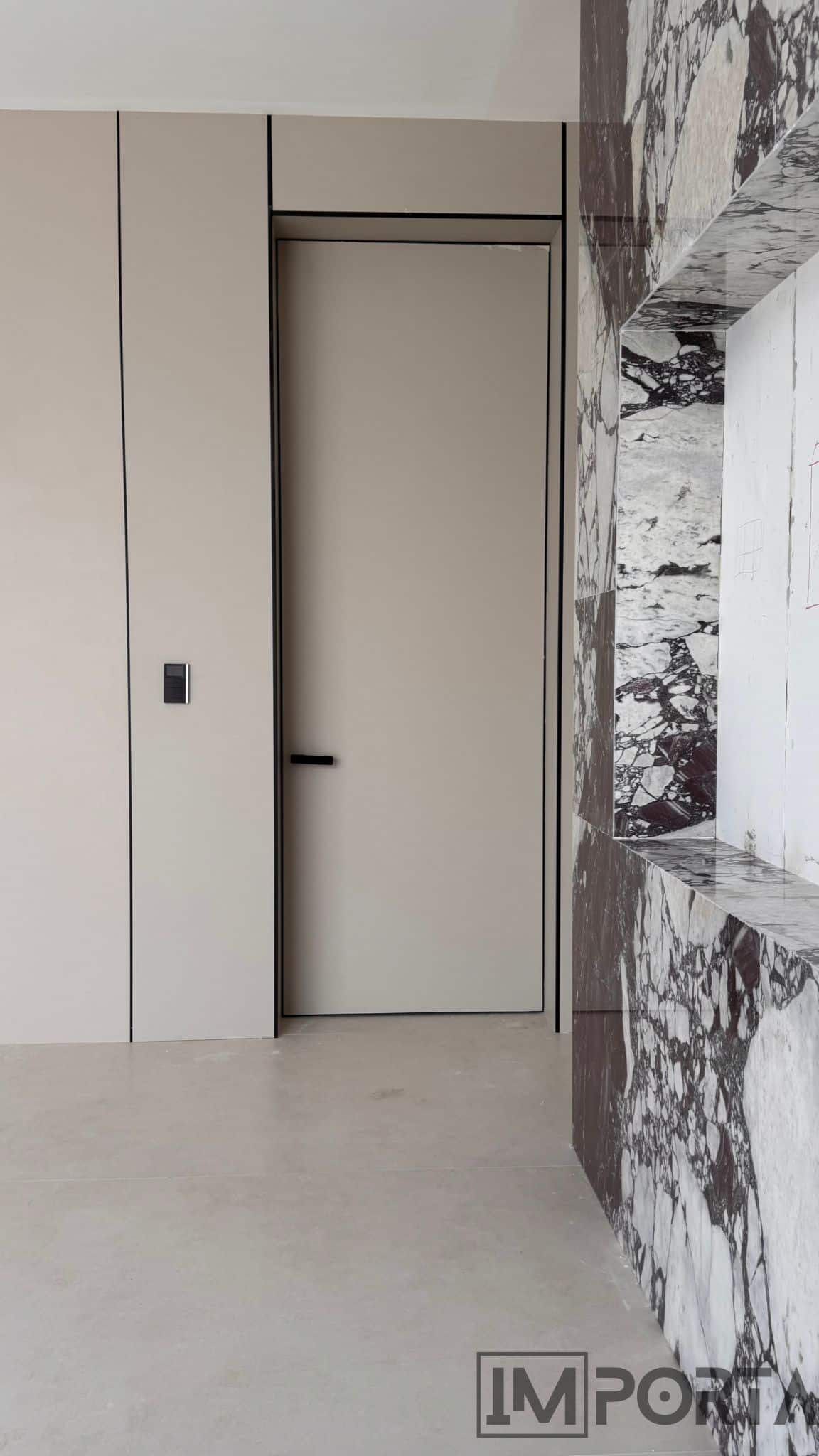 modern-flush-primed-door-black-trim.jpg