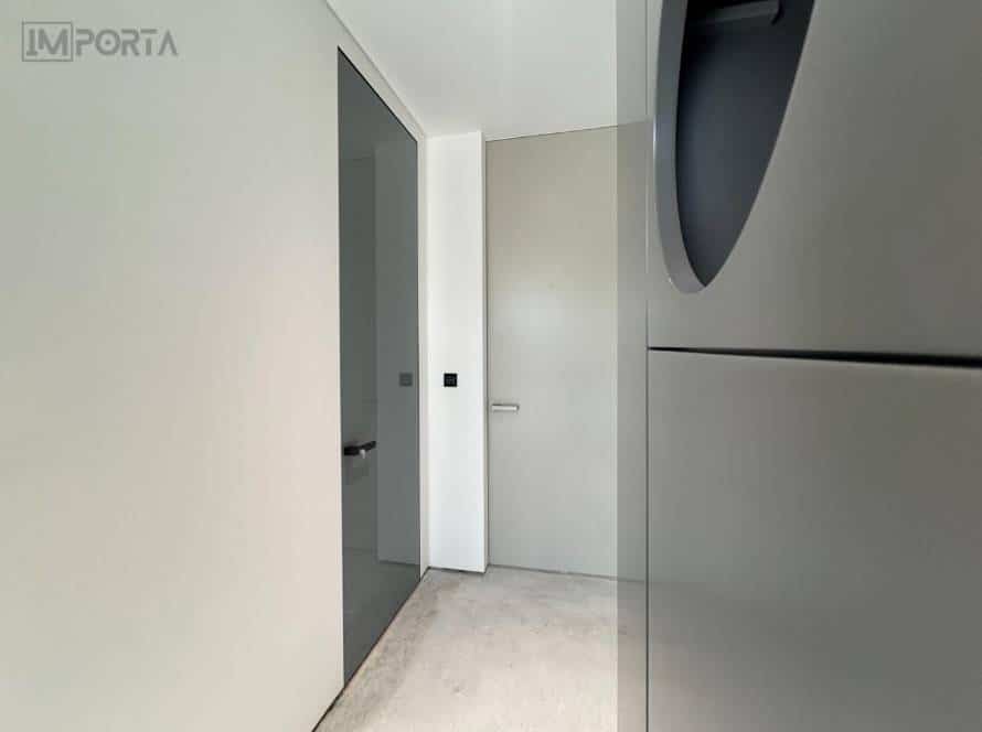 concealed-tempered-glass-door-for-residential-interiors