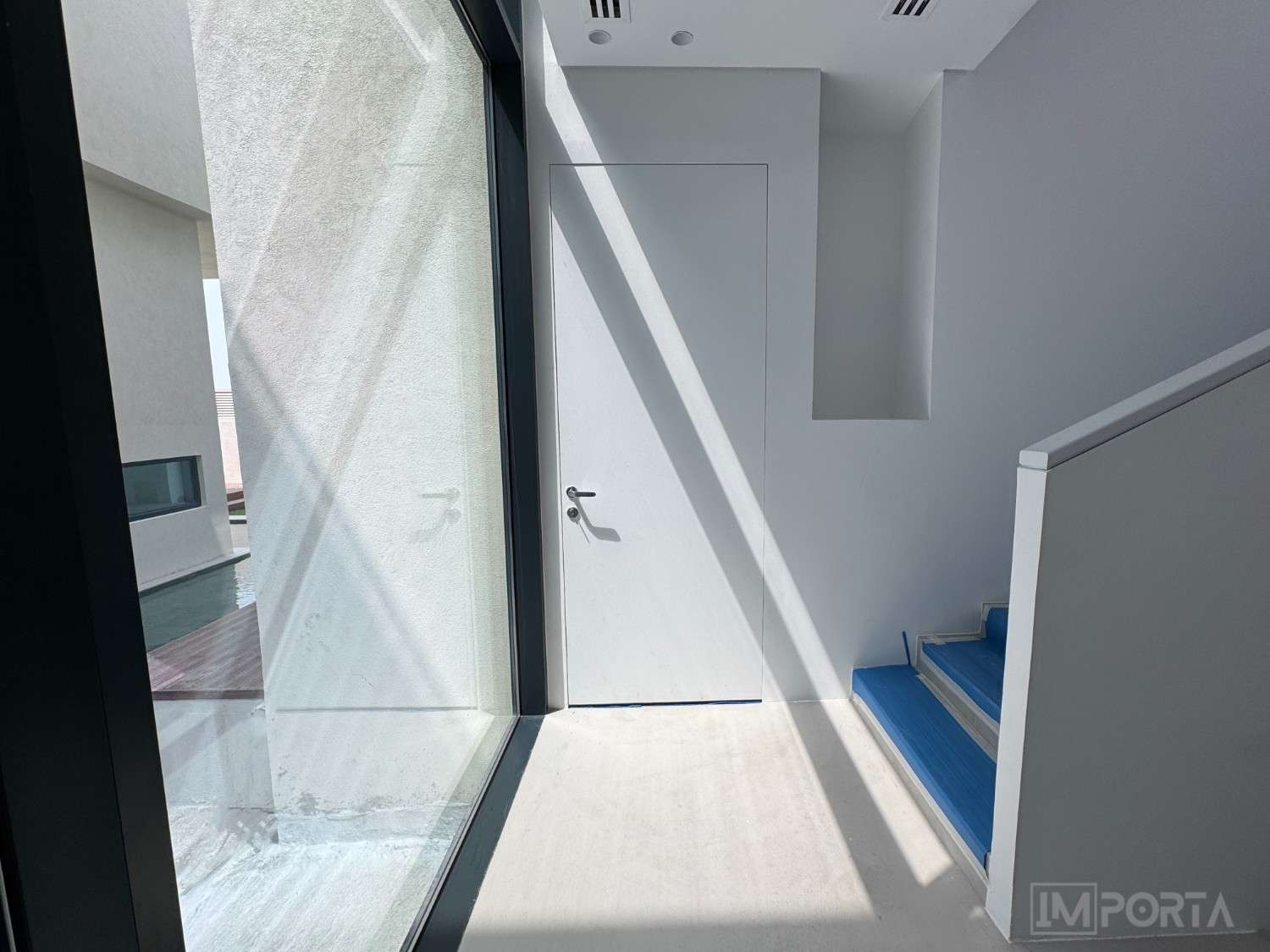 white-concealed-flush-door-residential-project-importa-uae white-concealed-flush-door-residential-project-importa-uae