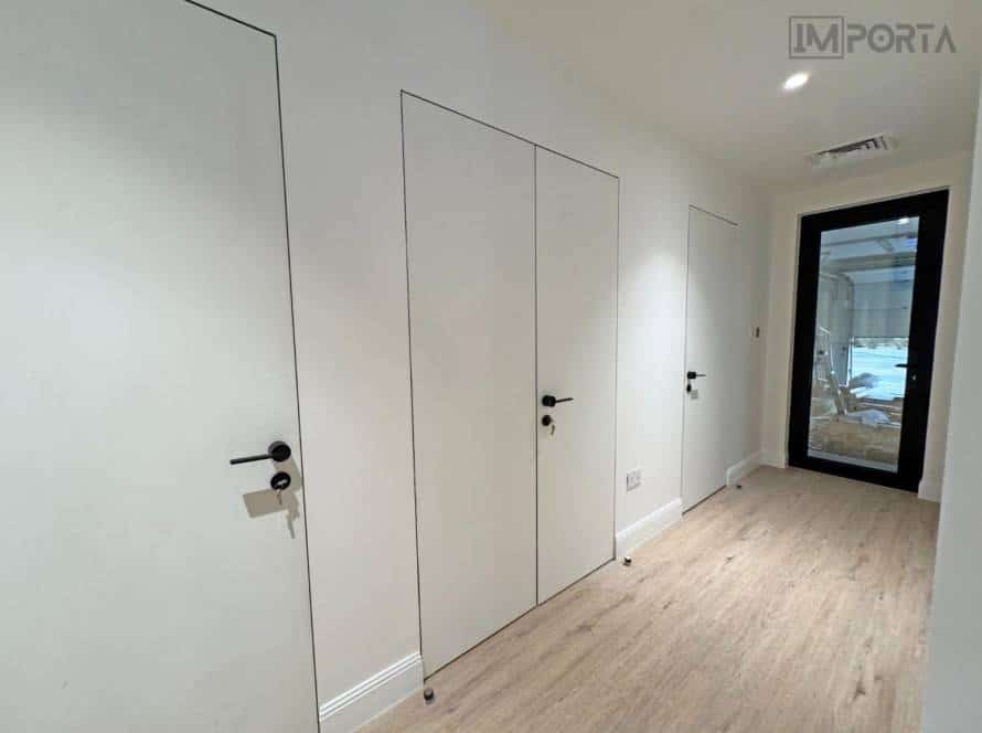 double leaf concealed door system for modern home