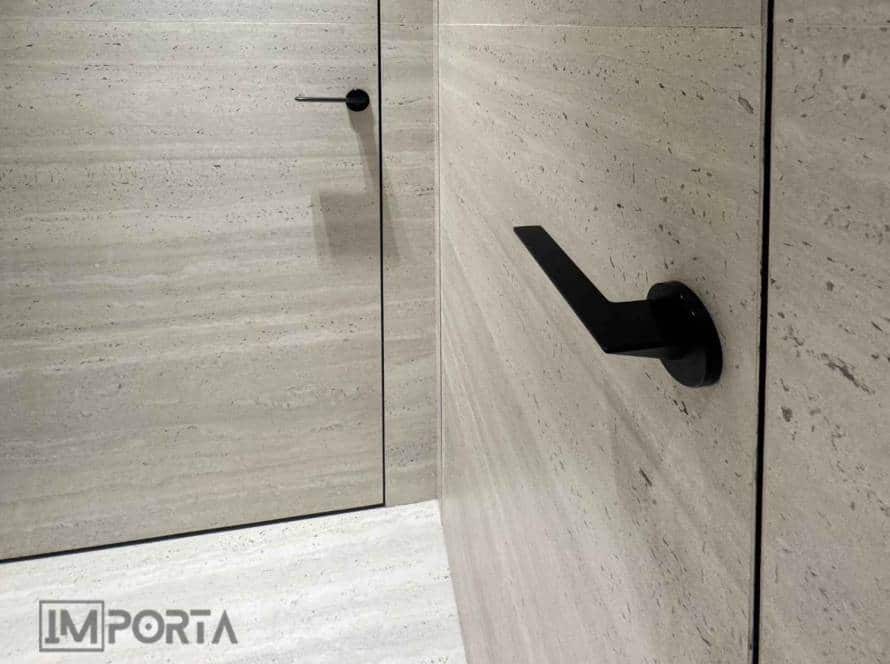 concealed door system full wall tile integration view