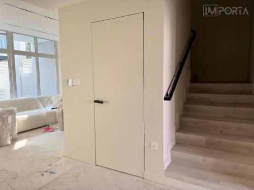 concealed primed door for villas dubai