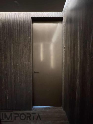 designer-flush-door-gold-frame-dubai.jpg