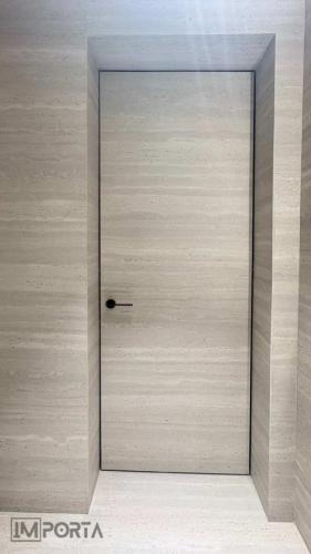 flush invisible door tile wall integration travertini m6