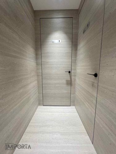 heavy-cladding-door-system-ceramic-porcelain-wall