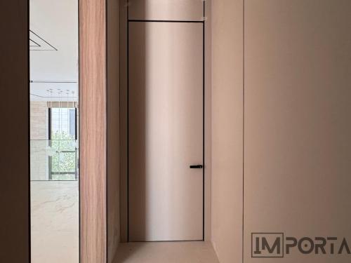 hidden-door-filomuro-handle-flush-importa.jpg