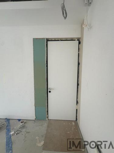 hidden-white-door-royal-black-trim-dubai.jpg
