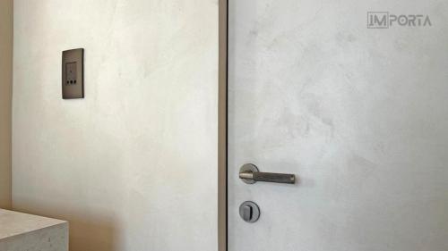 importa aurea metal surface concealed door curved architectural design