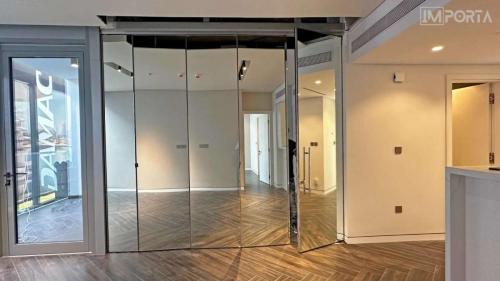 interior-hinged-partition-doors-luxury-villa-uae