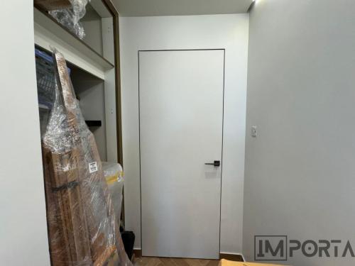 luxury-concealed-white-door-aluminum-frame-gold-edge.jpg
