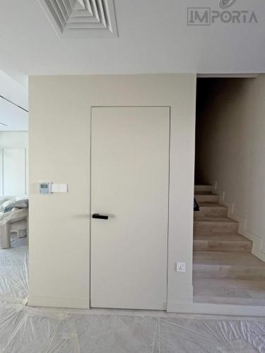 minimalist frameless door villa uae