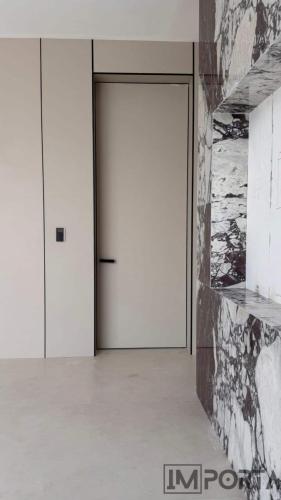 modern-flush-primed-door-black-trim.jpg