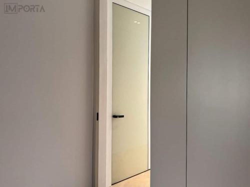 tempered-glass-concealed-door-residential-project-importa-uae