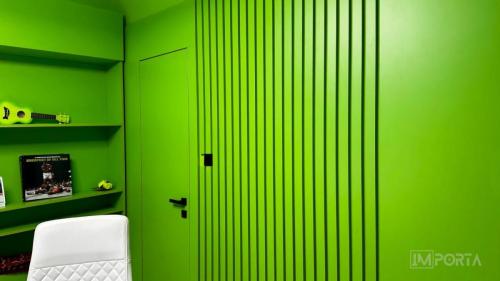 travertini architectural green hidden door system