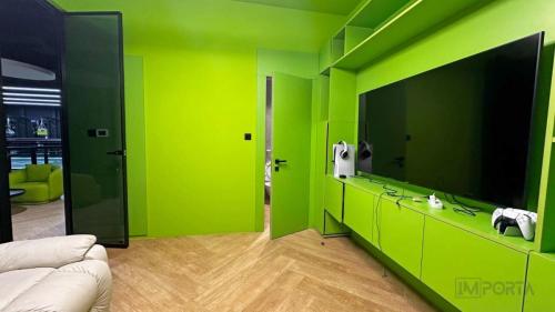 travertini green concealed door design silver frame