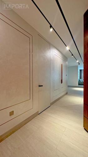 travertini invisible plaster door microcement system