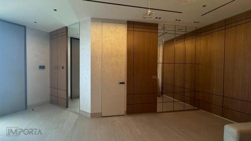 travertini minimalsit concealed door plaster finish