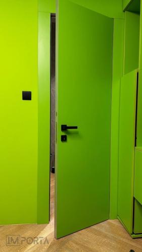travertini modern green invisible door uae interior