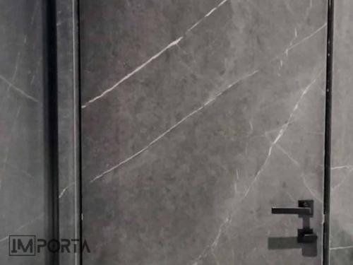travertini textured panel concealed door