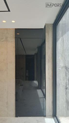 Black Tempered Glass Doors with Wall Panels -Importa UAE